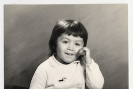 [Niñito hablando por teléfono]