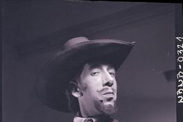 [Bailarín de ballet representando un personaje]