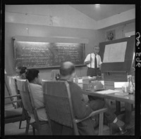 [Reunión de trabajo en la acería]