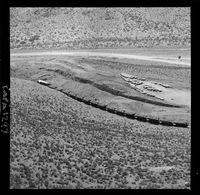 [Vista del ferrocarril que traslada en sus vagones el mineral de hierro]