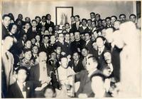 [Grupo de personas en reunión no identificada]