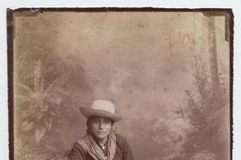 [Vendedora peruana, sentada con vestimenta típica]