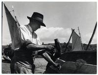 Calafateando un bote [en] Canal Tenglo